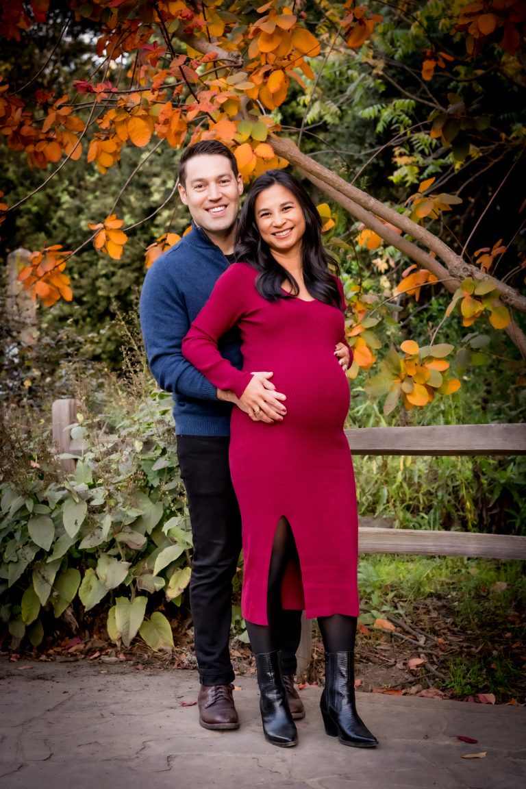 fall maternity portrait of couple expecting a baby by photographer Shelly Rivoli