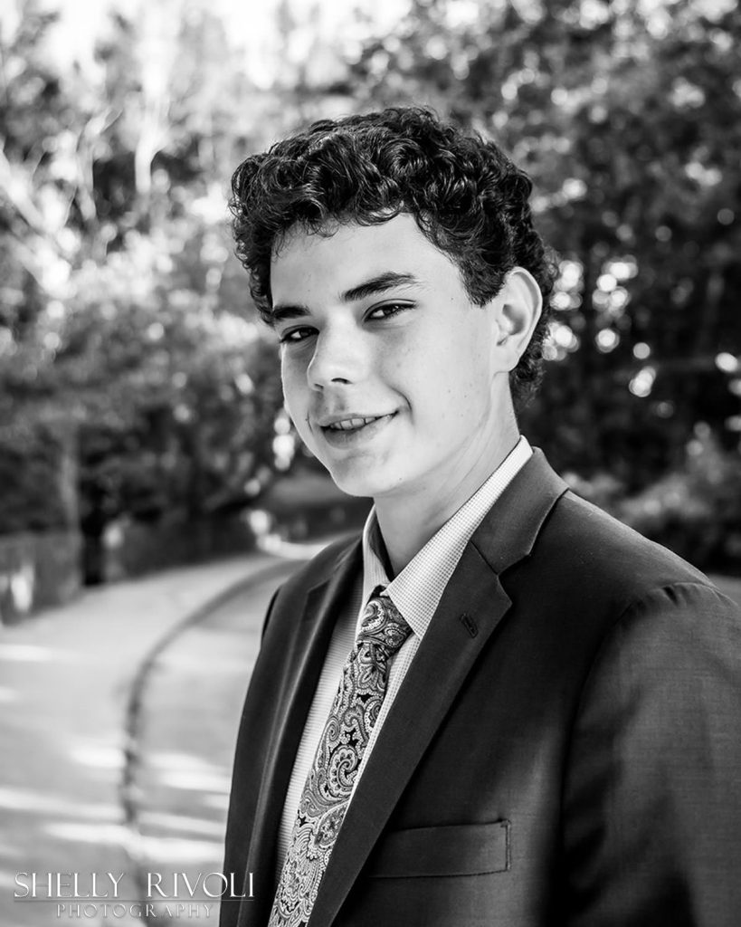 Bay Area senior portrait of young man in suit in BW by photographer Shelly Rivoli